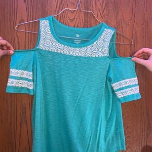 Cute off the shoulder shirt.